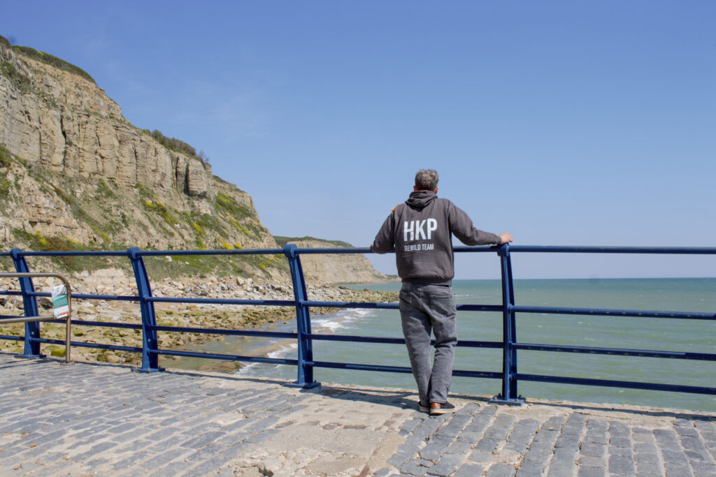 Chris Williams looking over Rock-A-Nore Beach on a sunny day in Hastings